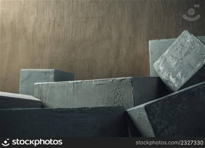 Concrete cube or construction brick as abstract background texture. Art or construction concept