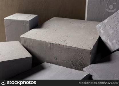 Concrete cube or construction brick as abstract background texture. Art or construction concept