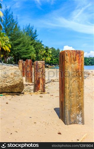 Concrete posts at the southern end of Bang Tao beach on Phuket, Thailand