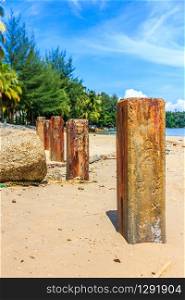 Concrete posts at the southern end of Bang Tao beach on Phuket, Thailand