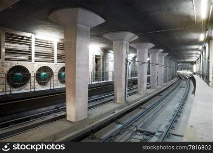 Concrete subway tunnel, with a set of huge ventilator for safety reasons