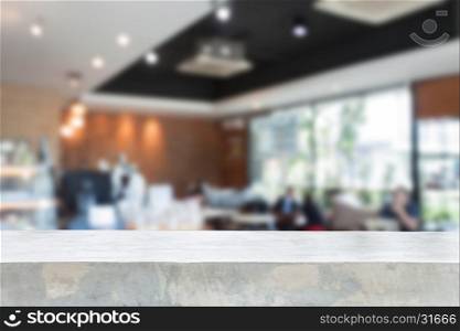 Concrete table top with blurred cafe interior for background