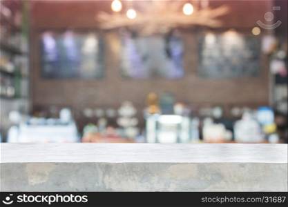 Concrete table top with blurred coffee shop interior for background