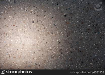 concrete wall with spot of light