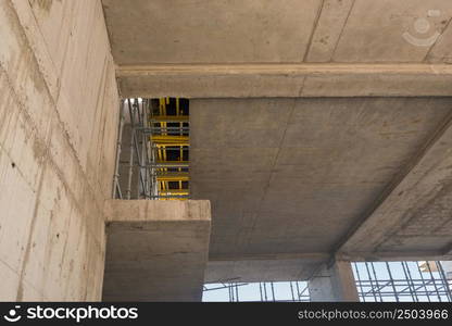 concrete walls and ceiling in the new building. metal concrete structures