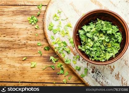 Condiment or spice made from dried green parsley.. Dried parsley leaves for cooking