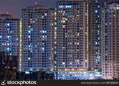 condo building, rent apartments at night in Thailand