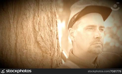 Confederate Civil War soldier leans on tree (Archive Footage Version)