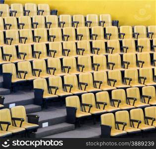 Conference hall with yellow chairs
