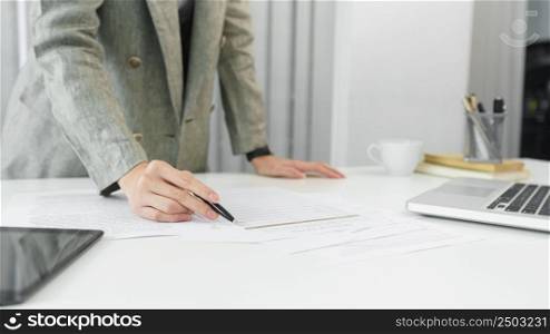 Confidence woman concept, Businesswoman is checking information to analyzing business strategy.