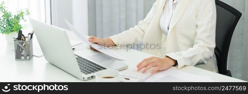 Confidence woman concept, Businesswoman read financial document to calculate cost of business.