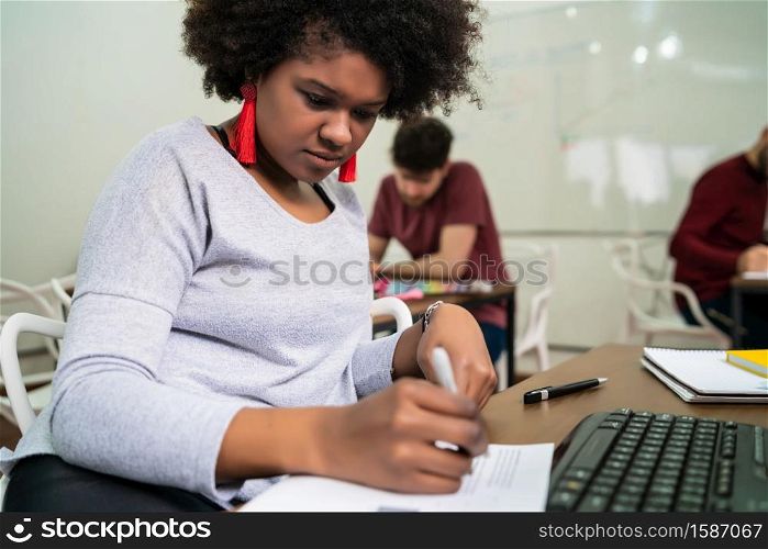 Confident Afro american business woman working in the office. Business concept.
