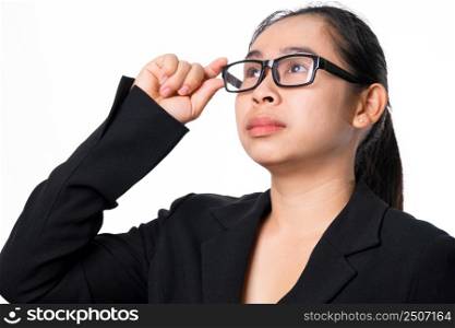 Confident Asian businesswoman looking up on white background in studio