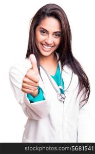 Confident brunette doctor doing thumbs up over white