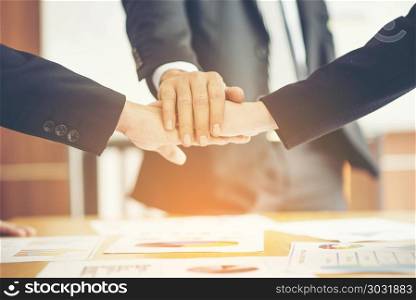 confident business man shaking hands during a meeting in the office, success, dealing, greeting and partner concept.