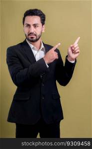Confident businessman in formal suit pointing finger up to indicate promotion or advertising with excited and amazed facial expression and gesture on isolated background. Fervent. Confident businessman in formal suit pointing finger. Fervent
