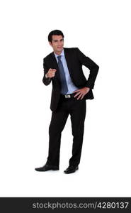 Confident businessman pointing at the camera