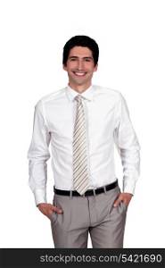 Confident businessman with hands in pockets