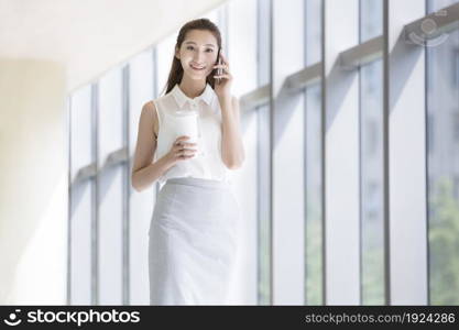 Confident businesswoman talking on the phone