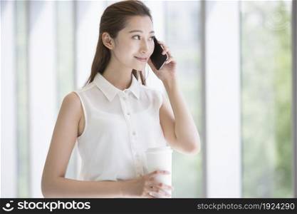Confident businesswoman talking on the phone