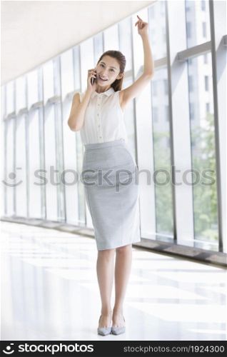 Confident businesswoman talking on the phone