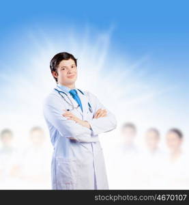 Confident doctor. Image of male doctor with arms crossed on chest