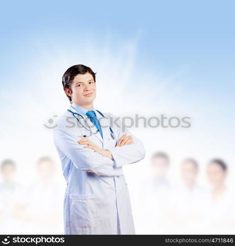 Confident doctor. Image of male doctor with arms crossed on chest