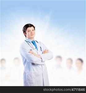 Confident doctor. Image of male doctor with arms crossed on chest