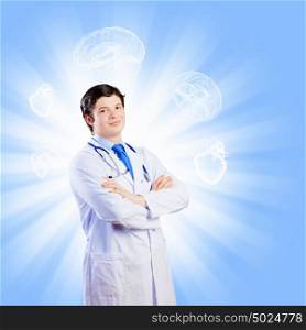 Confident doctor. Image of male doctor with arms crossed on chest