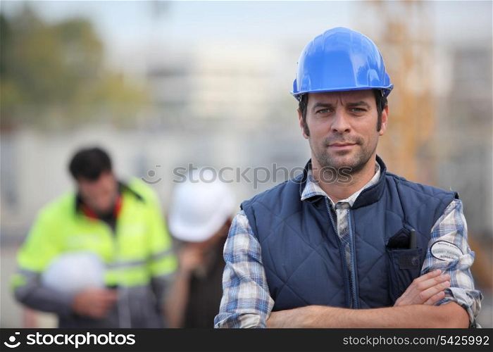 Confident foreman on construction site