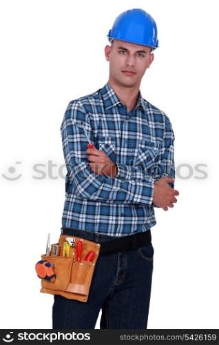 Confident laborer with arms crossed