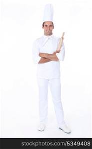 Confident pastry cook on white background