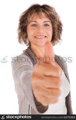 Confident senior woman gesturing thumbs-up isolated over white.