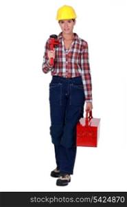 Confident woman plumber on white background