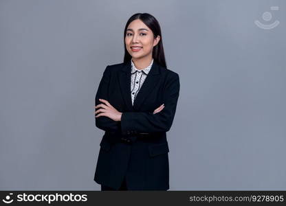 Confident young Asian businesswoman posing in professional outfit on isolated background. Symbol of success, optimism, and corporate office lady for business promotions and advertisements. Jubilant. Confident young Asian businesswoman posing on isolated background. Jubilant