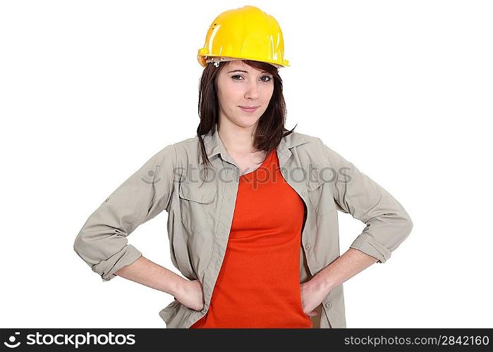 Confident young female builder