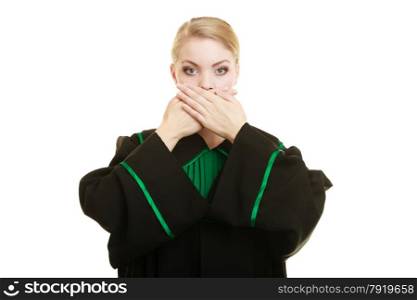 Confidential information. Law court or justice concept. Woman lawyer barrister wearing classic polish black green gown covering mouth with hands.