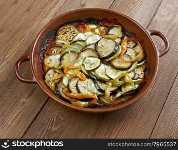 Confit byaldi - variation on the traditional French dish ratatouille .