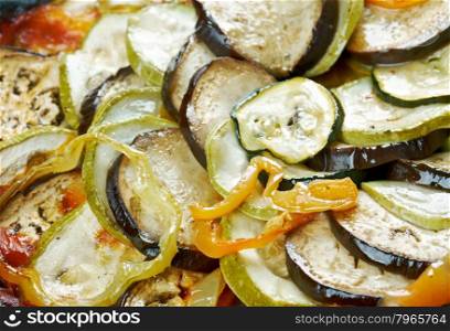 Confit byaldi - variation on the traditional French dish ratatouille .