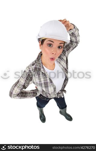 Confused female construction worker