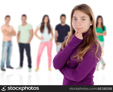 Confused teenager girl thinking with unfocused people of background