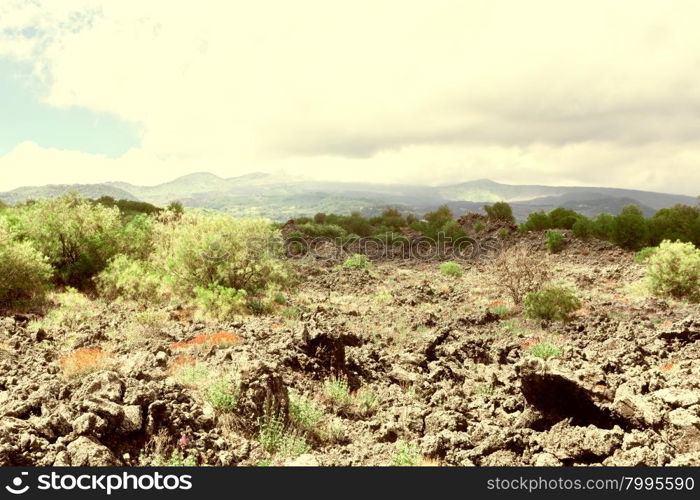 Congealed Black Lava on the Slopes of Mount Etna in Sicily, Vintage Style Toned Picture