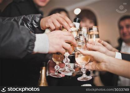 Congratulation on the glasses filled with wine.. Process of a congratulation oProcess of a congratulation oProces