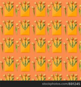 Congratulations pattern with tulips bouquets in envelopes on an orange background. Greeting postcard.. Decorative pattern with gift envelopes of tulips flowers on an orange.