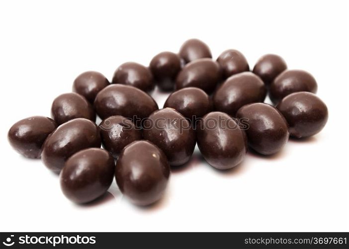 conguitos chocolate on a white background