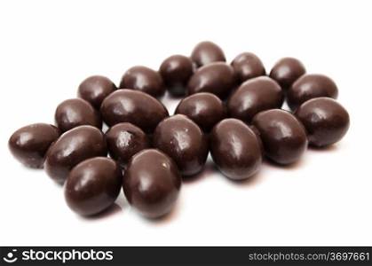 conguitos chocolate on a white background