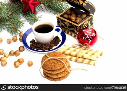 coniferous branch, baking, coffee and nutlets, still life subject Christmas and New Year
