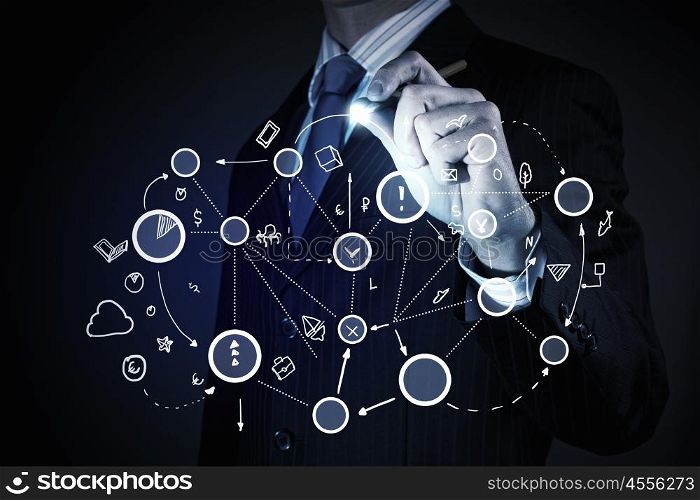 Connection and interaction concept. Chest view of businessman drawing connection lines on screen