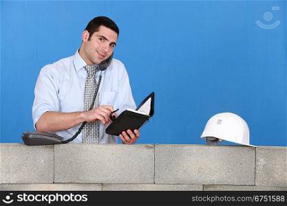 construction businessman talking on the phone