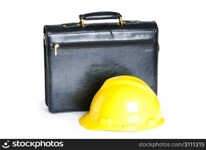 Construction concept - case and hard hat isolated on white